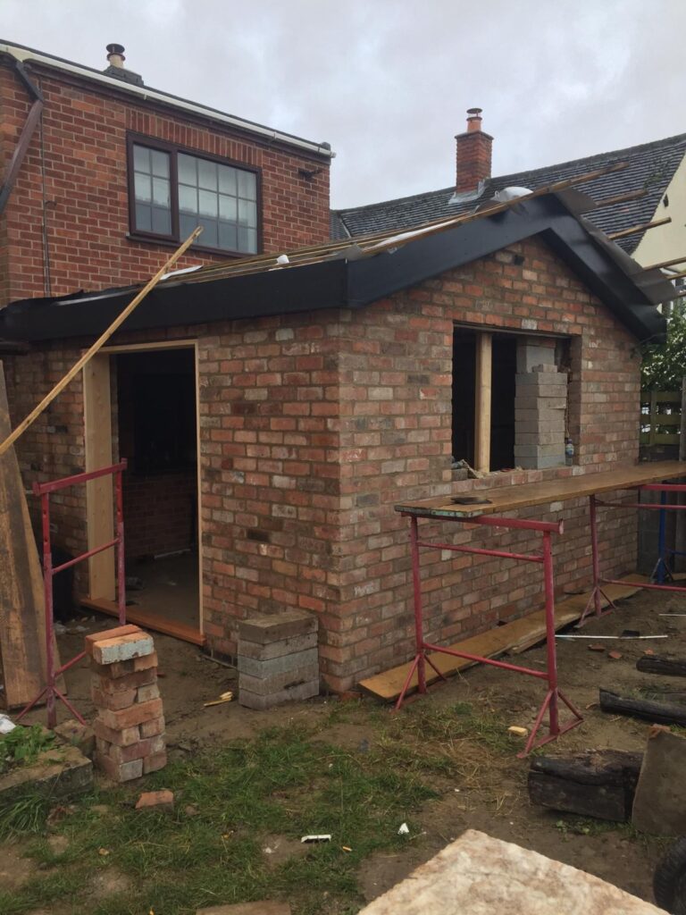 Photo of bricklaying extension in the progress of finishing